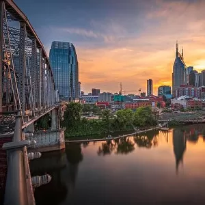 Nashville, Tennessee, USA downtown city skyline at dusk on the Cumberland River