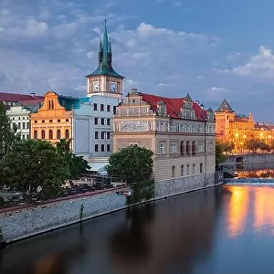 Prague Riverside. Cityscape image of Prague riverside with Old Town Water Tower at twilight blue hour