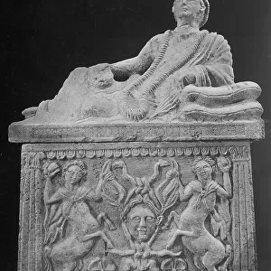 Etruscan cinerary urn with portrait in relief of the deceased with a plate in his right hand; on the front of the urn is instead represented the head of the Medusa in half and two rampant centaurs; the work is preserved in the National Etruscan Museum in Chiusi
