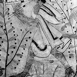 A musician playing the double flute. Detail of a wall painting in the Tomb of the Leopards in Tarquinia