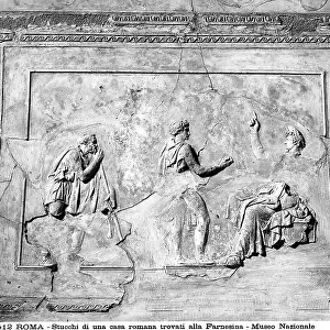 Two personages rendering homage to the emperor: stucco work found near Villa Farnesina and preserved in the National Museum of Rome, at the Baths of Diocletian, Rome
