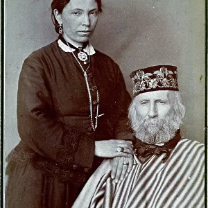 Portrait of Giuseppe Garibaldi and his third wife Francesca Armosino. The famous condottiere is seated. His wife is standing next to him, her hands resting on the right shoulder of her husband