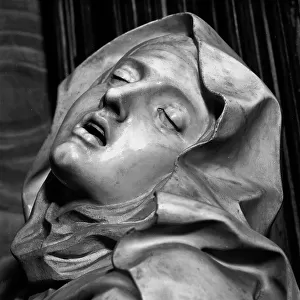 St. Theresa transfixed by the love of God, face detail. Detail of the sculptural group by Gian Lorenzo Bernini. Cornaro Chapel, church of Santa Maria della Vittoria, in Rome