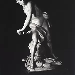 Statue of David hurling the sling, sculpted by Gian Lorenzo Bernini, at the Borghese Gallery in Rome