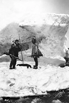 ALASKA: HUNTERS. An Eskimo and another man hunting in winter in the area of Nome, Alaska ALASKA: HUNTERS. An Eskimo and another man hunting in winter in the area of Nome, Alaska