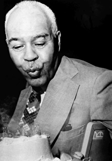 American civil rights leader. Wilkins, National Executive Director of the National Association for the Advancement of Colored People, blows out candles on a cake for his 75th birthday, presented to him by the Opportunities Industrialization Centers offices, where he is a guest speaker. 30 August, 1976, Philadelphia American civil rights leader. Wilkins, National Executive Director of the National Association for the Advancement of Colored People, blows out candles on a cake for his 75th birthday, presented to him by the Opportunities Industrialization Centers offices, where he is a guest speaker. 30 August, 1976, Philadelphia