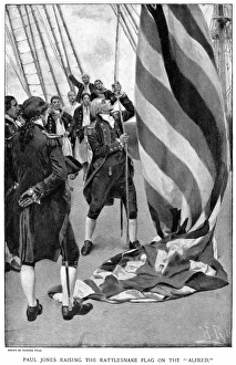 American (Scottish-born) naval commander. Jones raising the rattlesnake flag on the Continental Navy ship Alfred, 3 December 1775.Wood engraving, American, 1895, after Howard Pyle