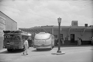 BUS STATION, 1940. Bus station in Durham, North Carolina. Photograph by Jack Delano BUS STATION, 1940. Bus station in Durham, North Carolina. Photograph by Jack Delano