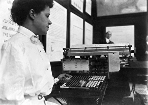 CENSUS TABULATOR, c1908. A U. S. Census Bureau tabulator and operator. Photograph, c1908