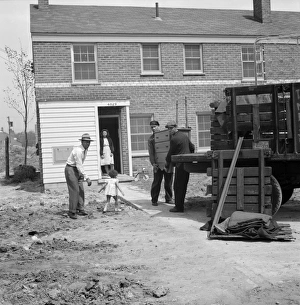 DETROIT, 1942. The first black family moving into the newly built Sojourner Truth DETROIT, 1942. The first black family moving into the newly built Sojourner Truth