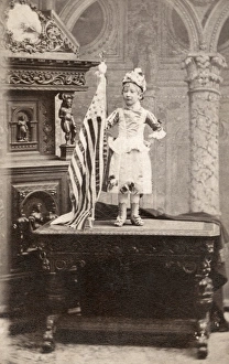 DWARF, c1880. Portrait of a dwarf woman standing on a desk next to an American flag DWARF, c1880. Portrait of a dwarf woman standing on a desk next to an American flag