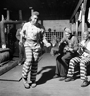 GEORGIA: CONVICTS, 1941. Prisoners playing music, singing and dancing in a convict GEORGIA: CONVICTS, 1941. Prisoners playing music, singing and dancing in a convict