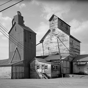 GRAIN ELEVATORS, 1990. Grain elevators in Chokio, Minnesota. Photograph, 1990