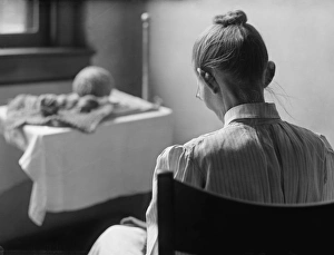 HOSPITAL, 1917. Seated woman shown from behind in Saint Elizabeths Hospital, Washington D HOSPITAL, 1917. Seated woman shown from behind in Saint Elizabeths Hospital, Washington D