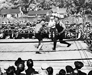 JACK DEMPSEY (1895-1983). American boxer. Dempsey sparring with a partner, c1919