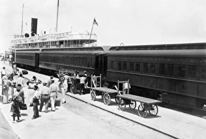 KEY WEST: TRAIN & SHIP. A passenger train in Key West, Florida, where a ship arriving KEY WEST: TRAIN & SHIP. A passenger train in Key West, Florida, where a ship arriving