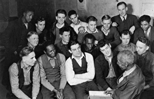 LABOR MEETING, 1930s. A labor organizer, lower right, at a community center meeting, 1930s LABOR MEETING, 1930s. A labor organizer, lower right, at a community center meeting, 1930s