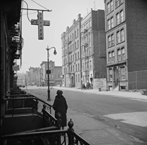 NEW YORK: HARLEM, 1943. A street scene in Harlem, New York. Photograph by Gordon Parks NEW YORK: HARLEM, 1943. A street scene in Harlem, New York. Photograph by Gordon Parks