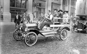 STREET CAR STRIKE. Group of women in the back of an automobile, going to work during STREET CAR STRIKE. Group of women in the back of an automobile, going to work during