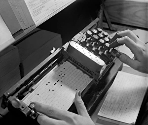 TABULATING MACHINE, c1940. A tabulating machine, used for processing census data