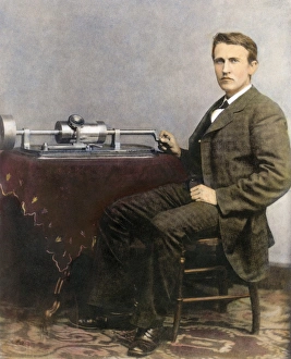 THOMAS EDISON (1847-1931). American inventor. Photographed with his phonograph THOMAS EDISON (1847-1931). American inventor. Photographed with his phonograph