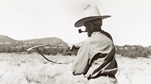 WELL WITCHING, 1940. A cowboy searching for water with a forked stick (dowsing WELL WITCHING, 1940. A cowboy searching for water with a forked stick (dowsing